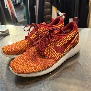 Nike shoes size 7 stretch red yellow fire womens